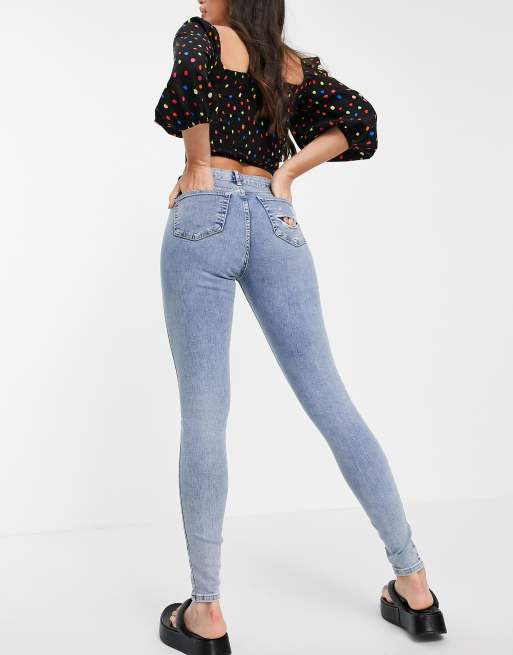 Topshop Tall Jamie jeans with abraded pocket in bleach