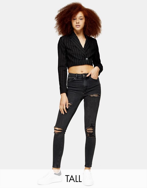 Topshop Tall Jamie skinny jeans with rips in black
