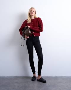 Model wearing Joni high rise super skinny jean in black