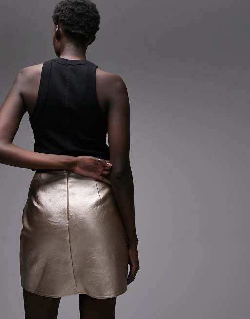 Topshop Tall leather look diagonal seam mini skirt in gold