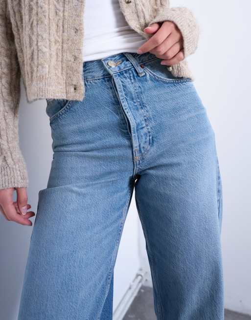 Topshop Tall mid rise loose fit straight jean in mid blue | ASOS