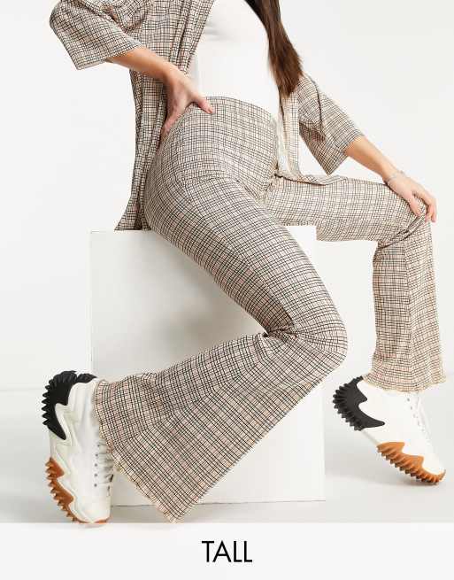 Topshop Tall plisse flared trouser in check print