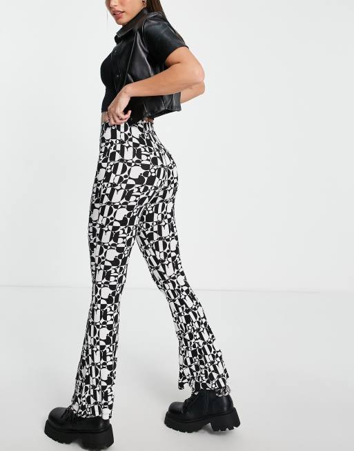 Topshop Tall retro checkerboard flared pants in black & white, 2 of 4