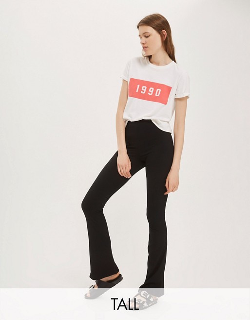 Topshop Tall skinny ribbed flare trousers in black