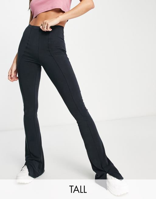 Topshop Tall – Spodnie z rozszerzanymi nogawkami z materiału cupro w kolorze spranej czerni z rozcięciami z przodu