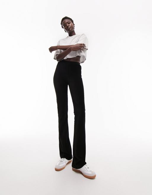 Topshop Tall stretchy velvet cord flare pants in black