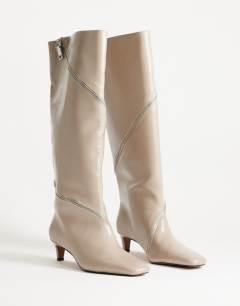 Model wearing Tao zip detail knee high boot in mushroom