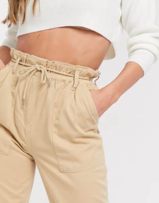 tan tapered trousers