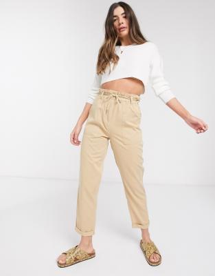 tan tapered trousers