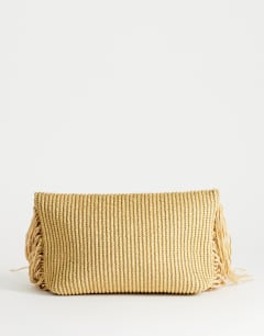 Model wearing Tassel oversized weave clutch bag in natural