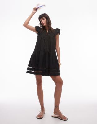 tassle detail broderie mini dress in black