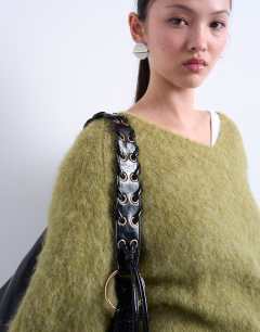 Model wearing Tatum whipstitch tote bag in black