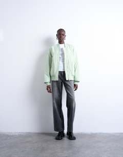Model wearing Techy bomber jacket in sage
