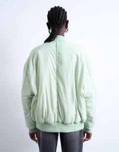 Model wearing Techy bomber jacket in sage