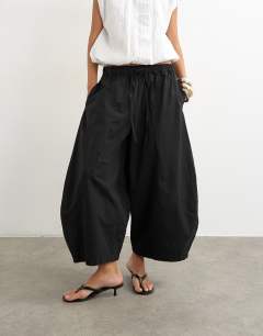 Model wearing Techy horseshoe trouser in black