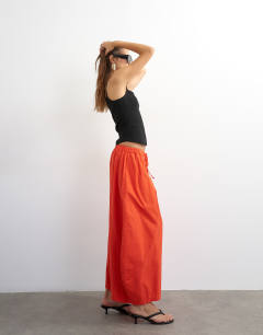 Model wearing Techy horseshoe trouser in red
