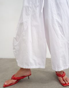 Model wearing Techy horseshoe trouser in white