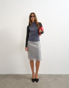 Model wearing Techy long sleeve quarter zip top in navy