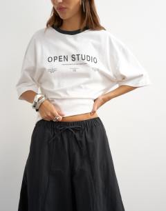 Model wearing Techy oversized ovoid mid length trouser in black