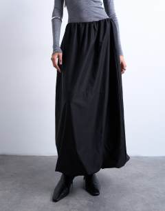Model wearing Techy seam detail bubble hem maxi skirt in black