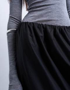 Model wearing Techy seam detail bubble hem maxi skirt in black