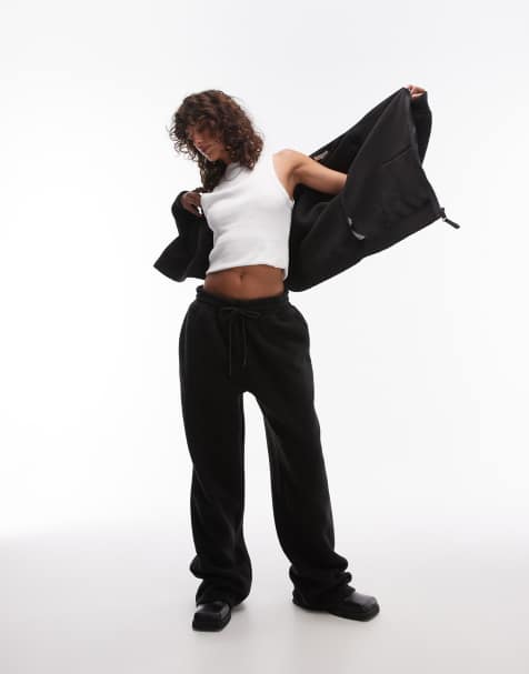 Topshop – Teddyfell-Hose in Schwarz mit weitem Bein, Kombiteil - view 1