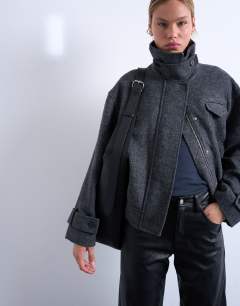 Model wearing Teegan premium real leather oversize weave tote in black