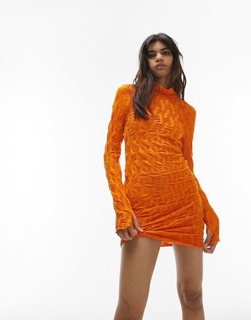 Topshop – Teksturowana dżersejowa sukienka mini z długim rękawem w  pomarańczowym kolorze | ASOS