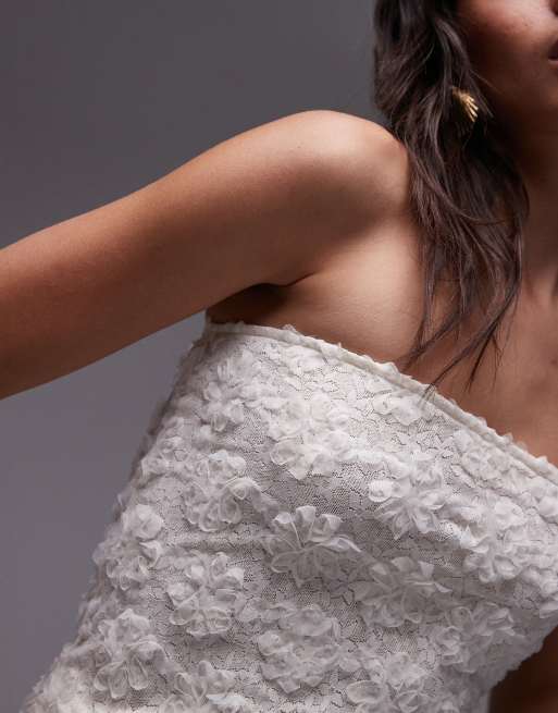 Top color crema con diseño floral y escote palabra de honor de tejido texturizado de Topshop