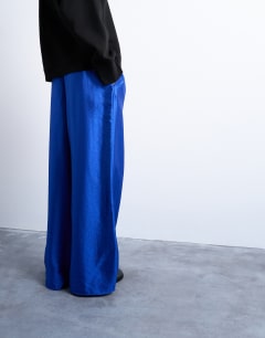 Model wearing Textured satin straight leg drawcord trouser in mid blue