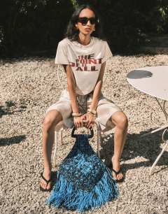 Model wearing The point of it all graphic tee in buttermilk
