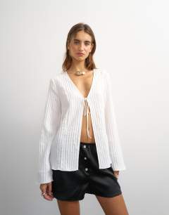 Model wearing Tie detail blouse in ecru