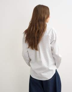 Model wearing Tie detail check shirt in white