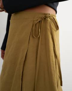 Model wearing Tie detail contrast organza maxi skirt in khaki