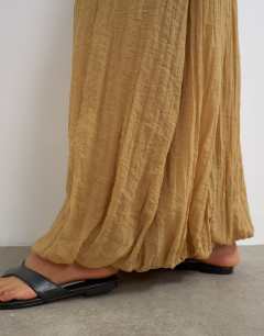 Model wearing Tie detail crinkle bubble hem maxi skirt in camel