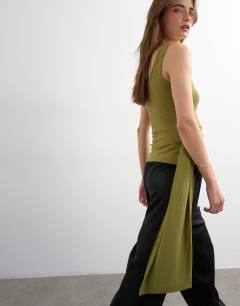 Model wearing Tie drape waist detail vest in olive green
