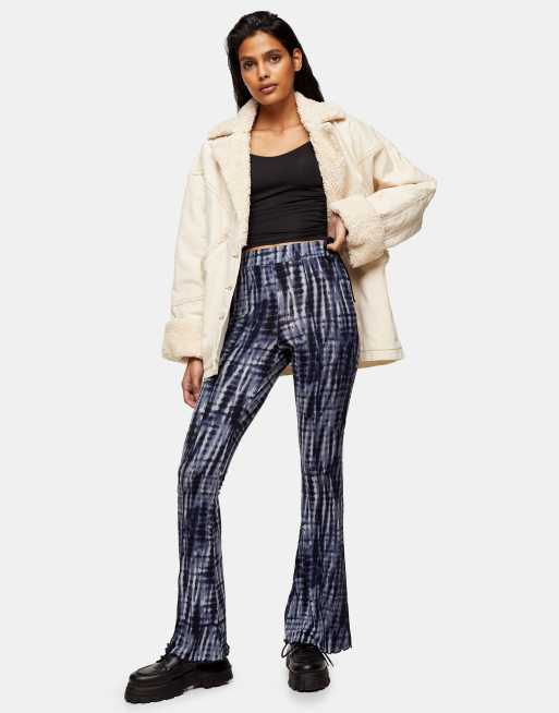 Topshop tie-dye lettuce hem flared trousers in blue
