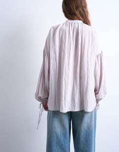 Model wearing Tie front top in mushroom