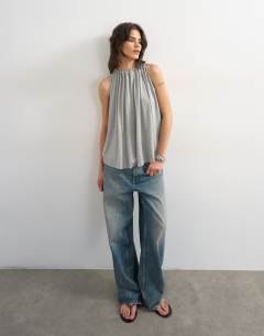 Model wearing Tie neck detail tank top in grey marl