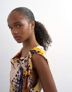 Model wearing Tie neck drape maxi dress in orchid print