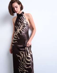 Model wearing Tie neck halter maxi dress in zebra print
