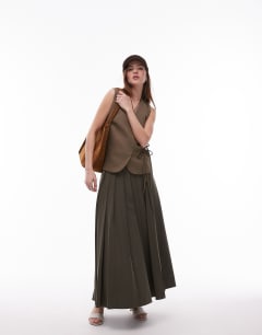 Model wearing Tie side waistcoat in khaki