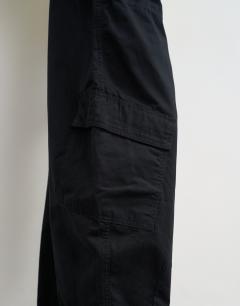 Model wearing Tie waist cargo trouser in black