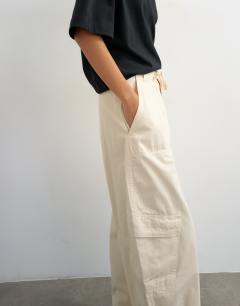 Model wearing Tie waist cargo trouser in ecru