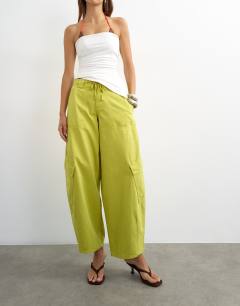 Model wearing Tie waist cargo trouser in lime green