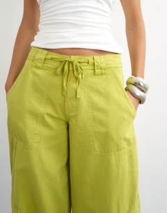 Model wearing Tie waist cargo trouser in lime green