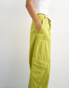 Model wearing Tie waist cargo trouser in olive