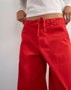 Model wearing Tie waist cargo trouser in red
