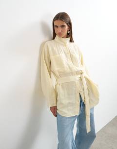 Tie waist funnel neck tunic top in buttermilk