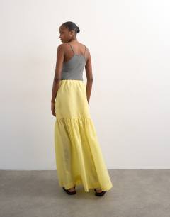Model wearing Tiered crinkle maxi skirt in yellow